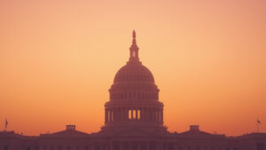 Golden-hour silhouette of the U.S. Capitol dome, symbolizing Congress's first hearing on menopause